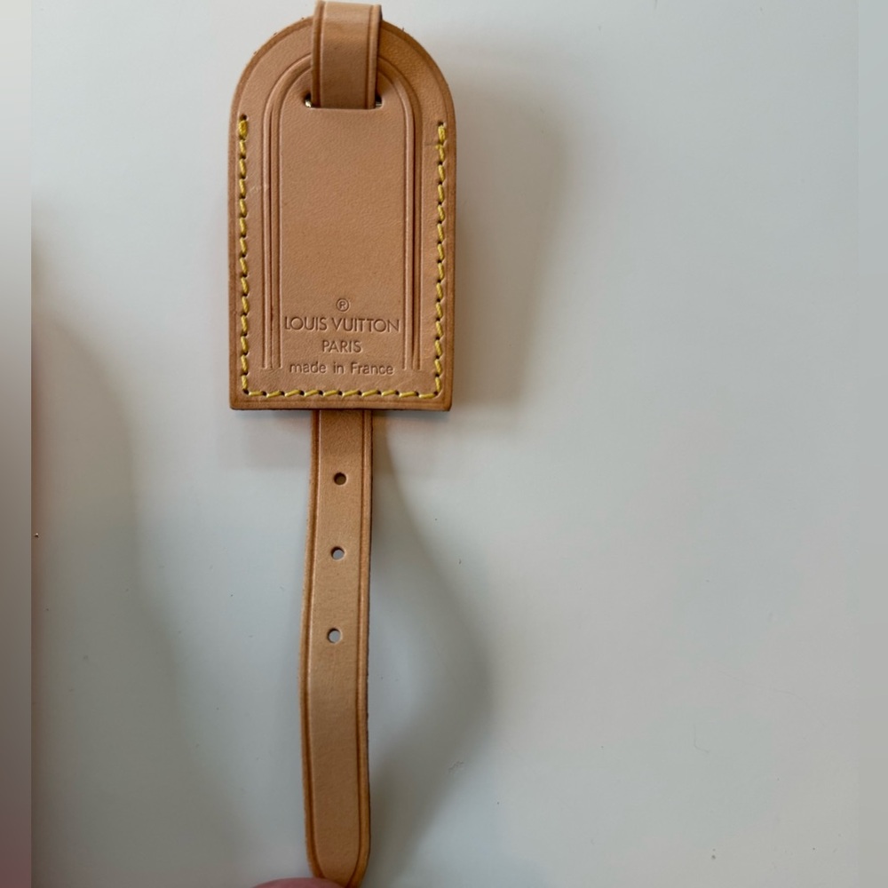 NWOT. Louis Vuitton bag/luggage tag.
